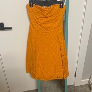 Strapless orange large eyelet fitted dress